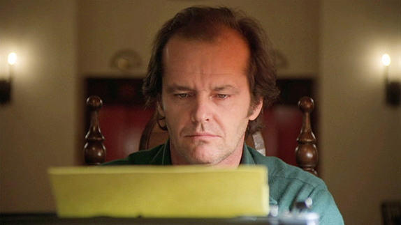 The movie "The Shining", directed by Stanley Kubrick, based on the novel by Stephen King. Seen here, Jack Nicholson as Jack Torrance at a typewriter. Initial theatrical release May 23, 1980.  Screen capture. © 1980 Warner Bros. Credit: © 1980 Warner Bros. / Flickr / Courtesy Pikturz.  Image intended only for use to help promote the film, in an editorial, non-commercial context.